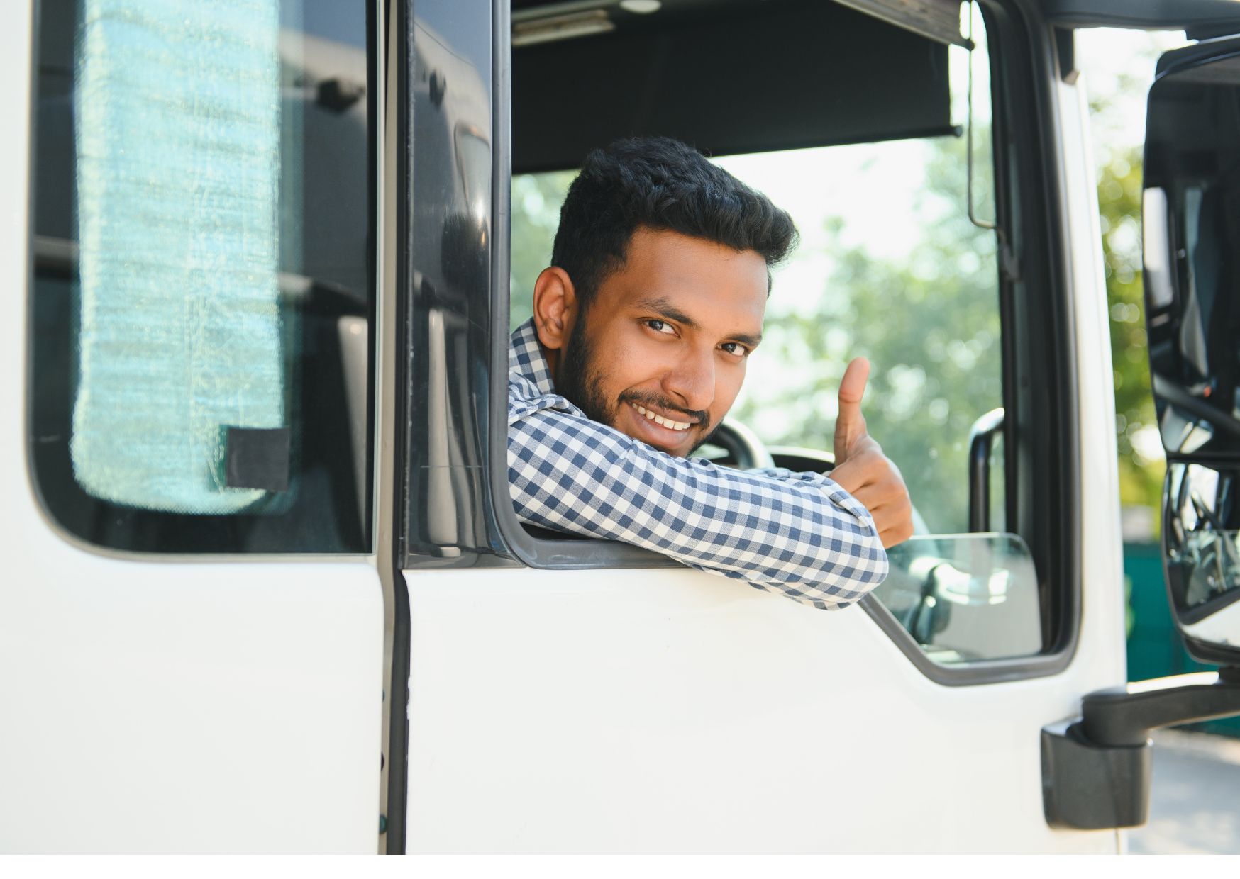 Truck driver giving a thumbs up